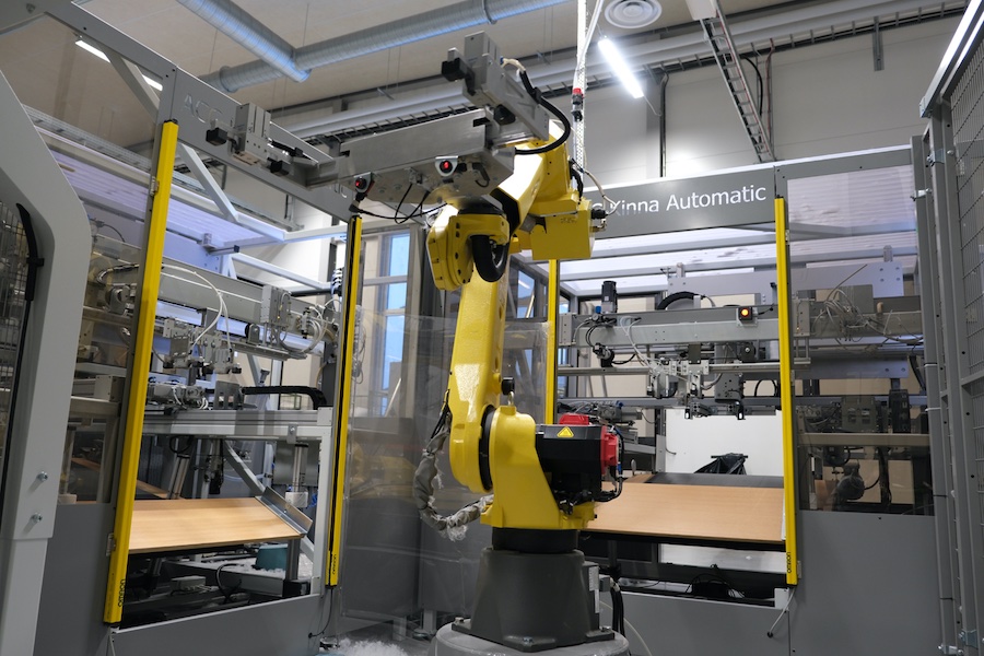 ACG Kinna Automatic has pioneered the development of complete robotic lines for the production of pillows and duvets. © 2025 TMAS