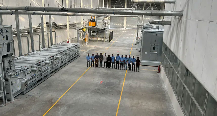 (c) 2025 ANDRITZ GROUP - Pacific Jeans and ANDRITZ teams with the newly installed tearing line